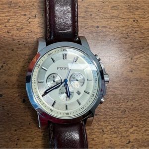 Fossil watch for sale. Slight wear. The battery still runs as of posting date.